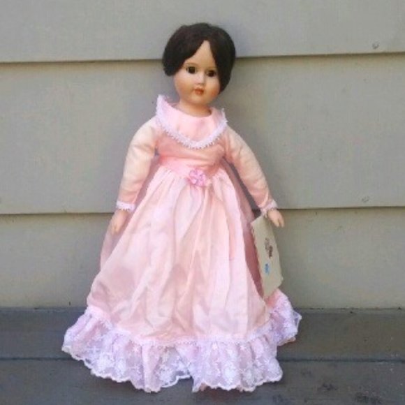 Anna's Dolls Other - Antique porcelain doll with stand. Still has original tag - Anna's Dolls 1982.